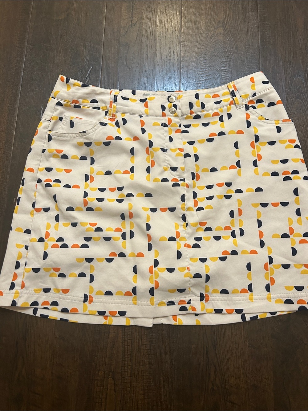 SLAZENGER Patterned White GOLF Skirt with Navy and Yellow Semi-Circle Print